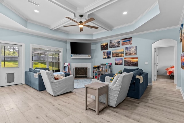 213 Archer Trl, Enterprise, AL 36351 - living area with a ceiling fan, visible vents, arched walkways, light wood-type flooring, and coffered ceiling