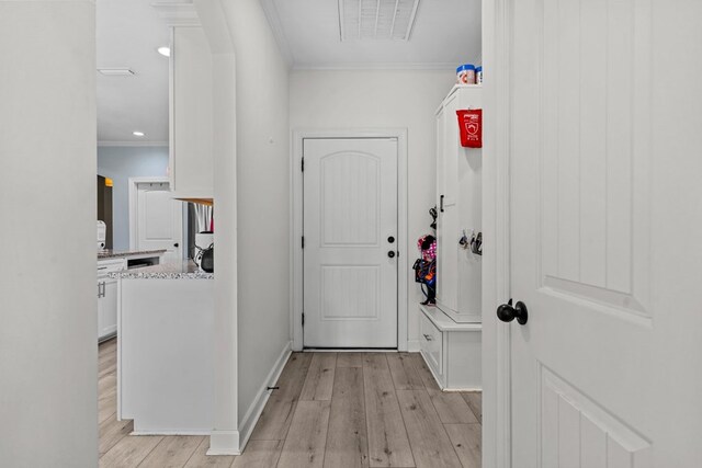 213 Archer Trl, Enterprise, AL 36351 - interior space featuring crown molding, baseboards, visible vents, and light wood finished floors