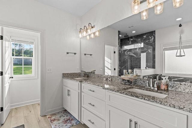 213 Archer Trl, Enterprise, AL 36351 - full bathroom with double vanity, a sink, baseboards, and a shower stall
