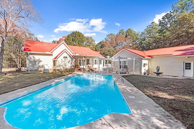 view of swimming pool featuring an outdoor structure, a pergola, and a patio