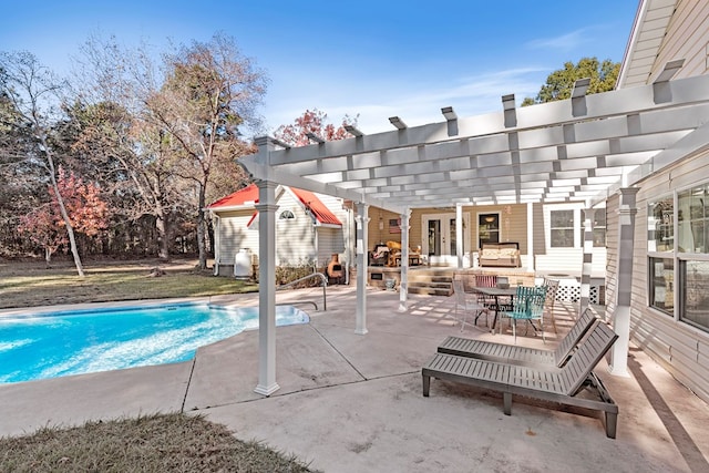 view of pool featuring outdoor lounge area, a pergola, and a patio area