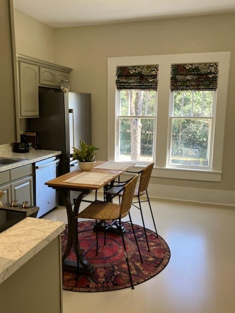 dining room featuring baseboards