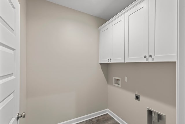 washroom featuring hookup for an electric dryer, dark hardwood / wood-style floors, cabinets, and hookup for a washing machine