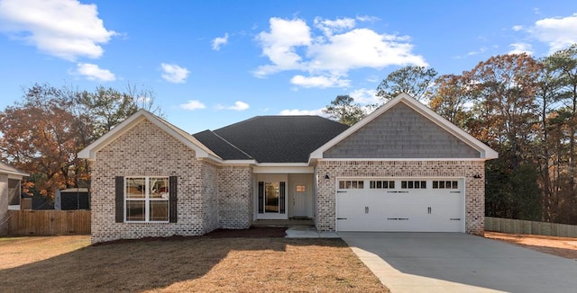 view of front of property with a garage