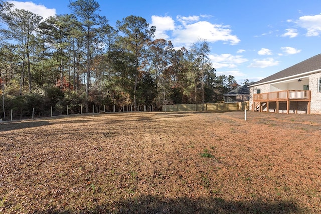 view of yard with a wooden deck