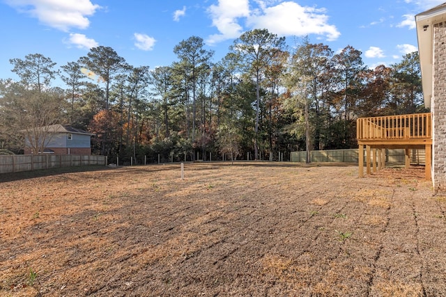 view of yard featuring a deck