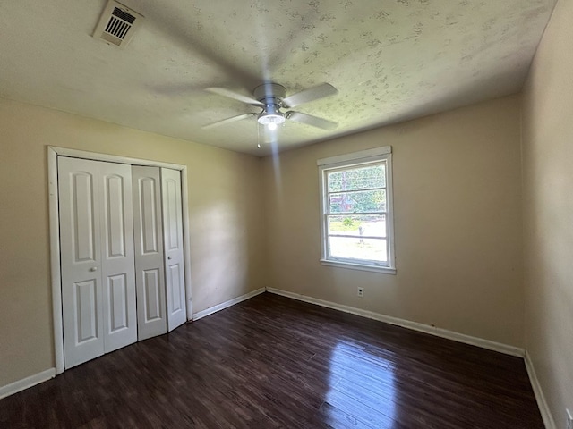 402 Reid Dr, Dothan, AL 36301 - unfurnished bedroom featuring wood finished floors, a closet, and ceiling fan