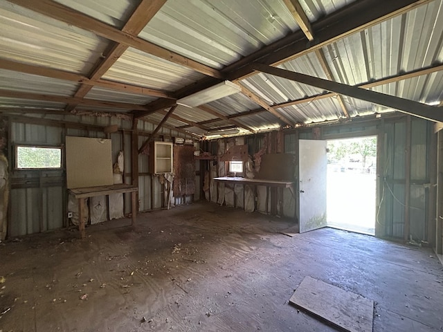 402 Reid Dr, Dothan, AL 36301 - misc room featuring a garage, lofted ceiling, and plenty of natural light
