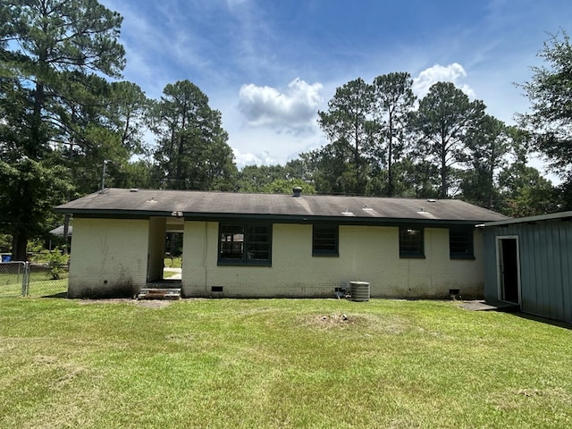 402 Reid Dr, Dothan, AL 36301 - back of house with crawl space, brick siding, and a shingled roof