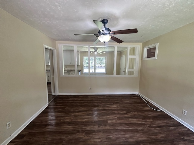 402 Reid Dr, Dothan, AL 36301 - empty room featuring ceiling fan, wood finished floors, and a textured ceiling