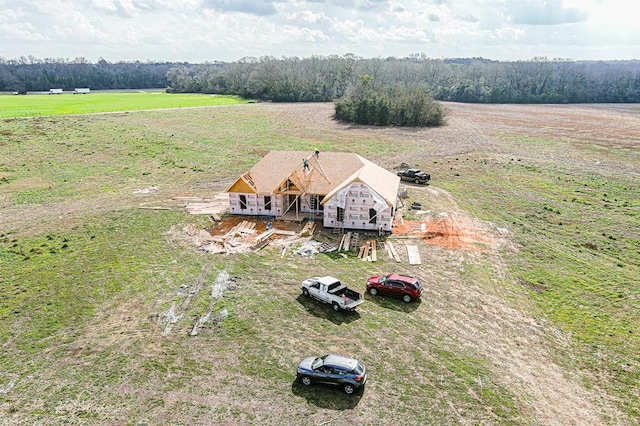 birds eye view of property with a rural view