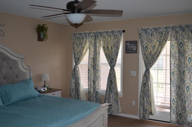 124 Whitney Ave, Enterprise, AL 36330 - carpeted bedroom featuring baseboards and ceiling fan