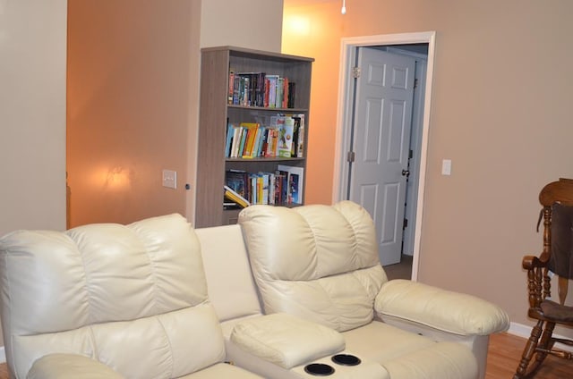 124 Whitney Ave, Enterprise, AL 36330 - sitting room with wood finished floors and baseboards