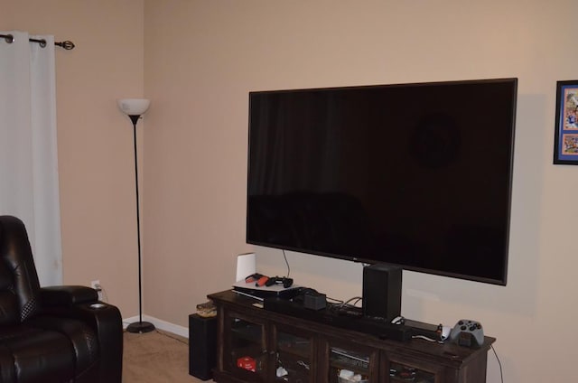 124 Whitney Ave, Enterprise, AL 36330 - living room with light carpet and baseboards