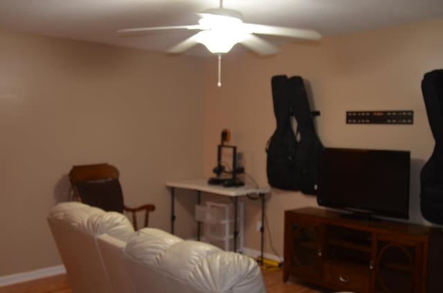 124 Whitney Ave, Enterprise, AL 36330 - living room featuring a ceiling fan and wood finished floors