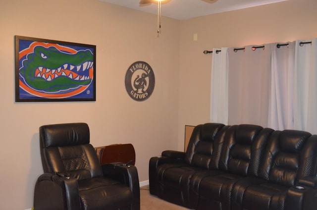 124 Whitney Ave, Enterprise, AL 36330 - carpeted living room with ceiling fan and baseboards