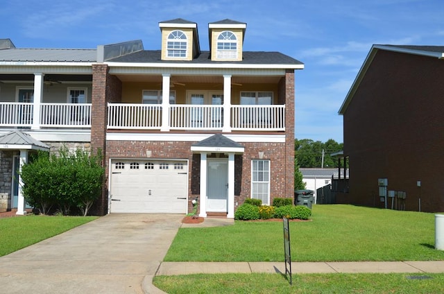 124 Whitney Ave, Enterprise, AL 36330 - view of front of home with a balcony, a front yard, driveway, and brick siding