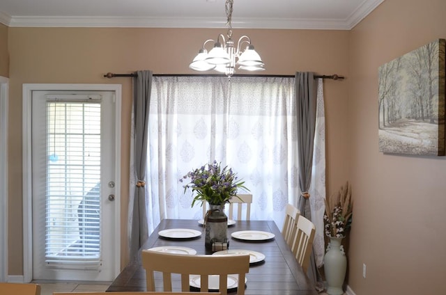 124 Whitney Ave, Enterprise, AL 36330 - dining space with a chandelier and crown molding