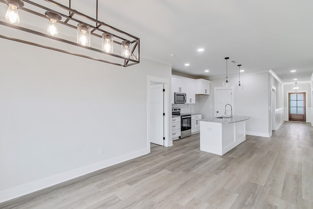 1919 Silcox Rd, Ashford, AL 36312 - kitchen featuring white cabinets, a sink, appliances with stainless steel finishes, and light wood finished floors