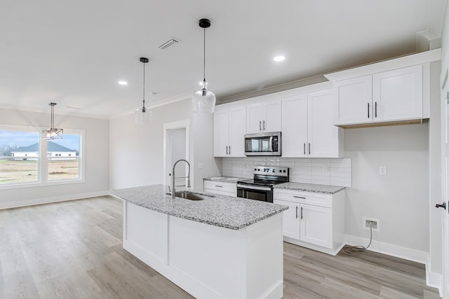 1919 Silcox Rd, Ashford, AL 36312 - kitchen with tasteful backsplash, a sink, visible vents, light stone countertops, and appliances with stainless steel finishes
