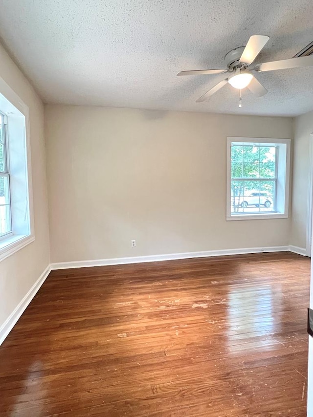 115 Westmont Dr, Dothan, AL 36301 - spare room featuring a textured ceiling, wood finished floors, and ceiling fan