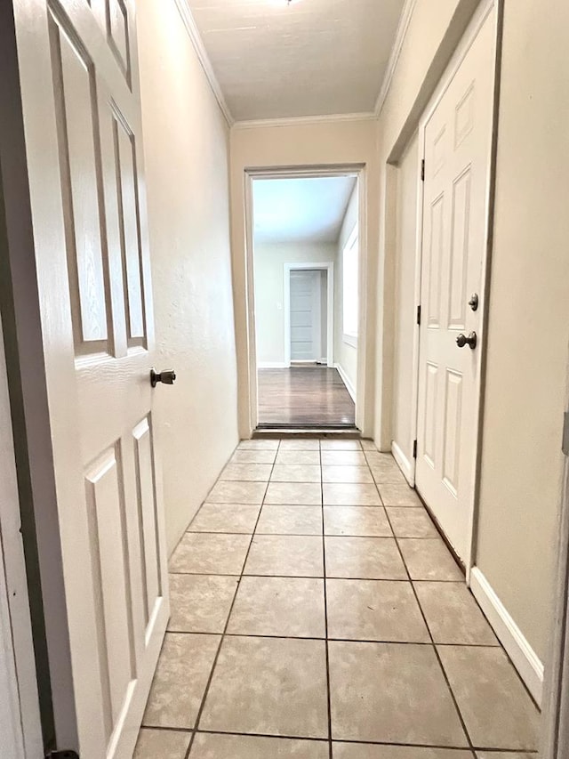 115 Westmont Dr, Dothan, AL 36301 - hallway with crown molding and light tile patterned floors