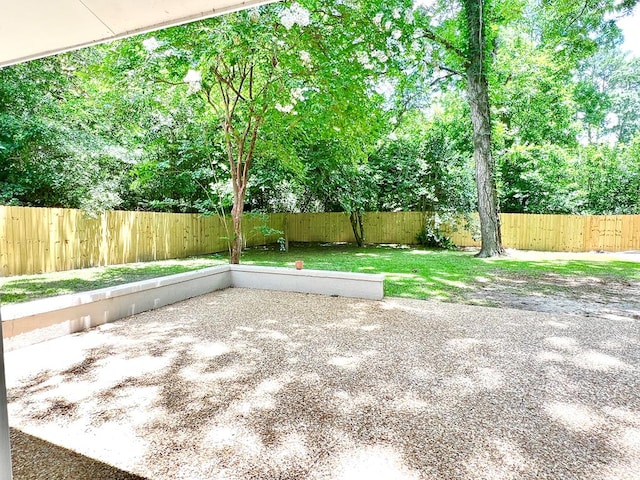 115 Westmont Dr, Dothan, AL 36301 - fenced backyard with a patio area