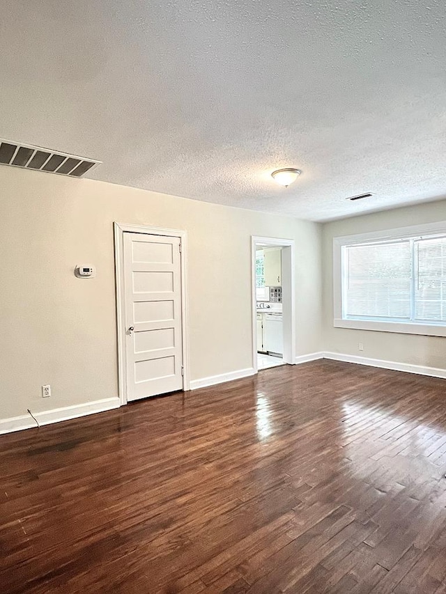 115 Westmont Dr, Dothan, AL 36301 - unfurnished room with dark wood finished floors and a textured ceiling