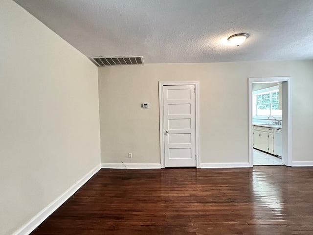 115 Westmont Dr, Dothan, AL 36301 - empty room featuring wood finished floors and a textured ceiling