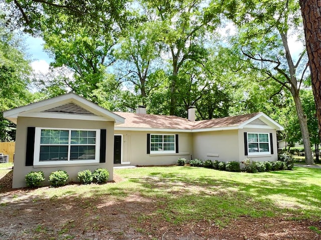 115 Westmont Dr, Dothan, AL 36301 - ranch-style home featuring a chimney, a front yard, and stucco siding