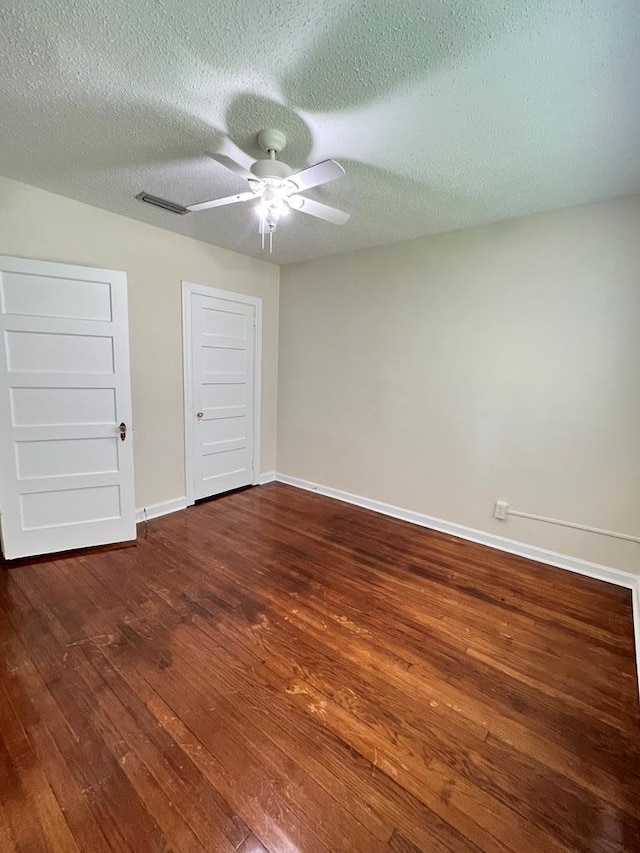 115 Westmont Dr, Dothan, AL 36301 - unfurnished bedroom featuring hardwood / wood-style flooring, ceiling fan, a textured ceiling, and a closet