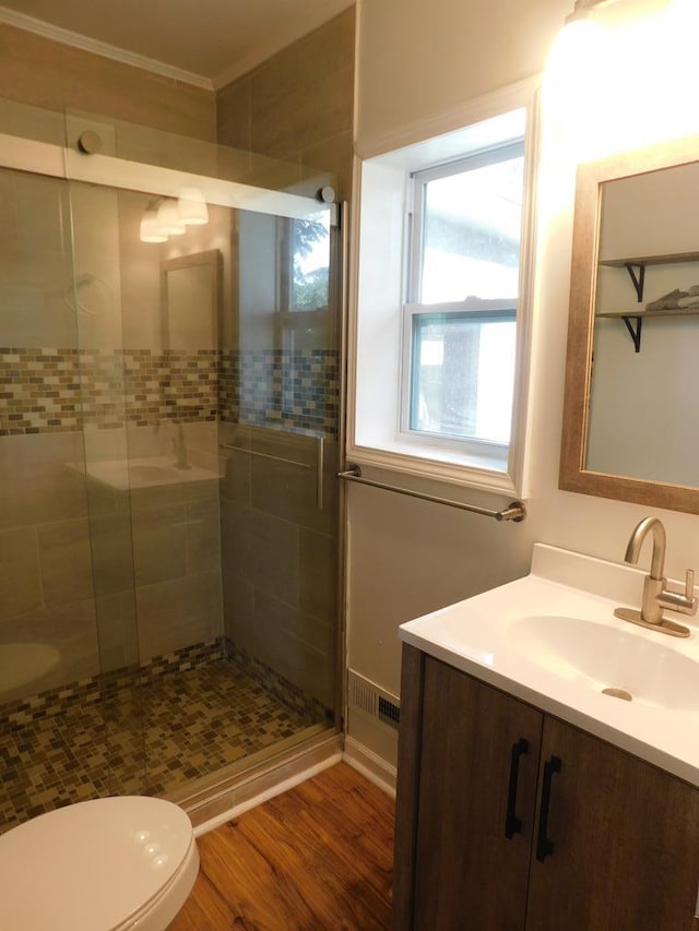 207 Seeba Dr, Dothan, AL 36303 - full bath with vanity, a shower stall, crown molding, and wood finished floors