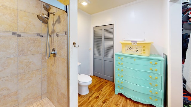 207 Seeba Dr, Dothan, AL 36303 - full bath with a closet, wood finished floors, a tile shower, and crown molding