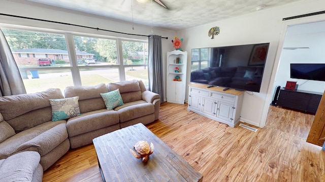 207 Seeba Dr, Dothan, AL 36303 - living room with light wood-style floors and a ceiling fan