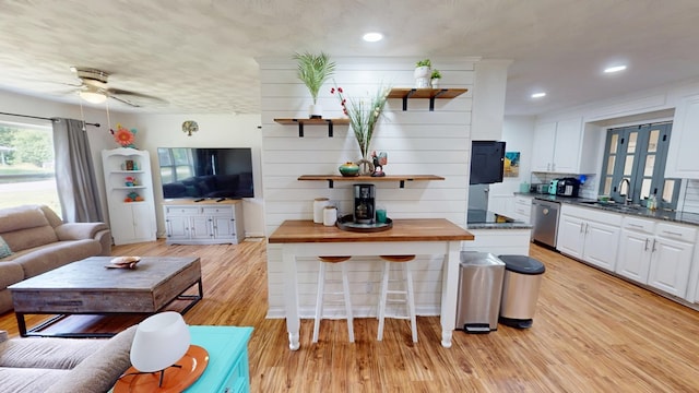 207 Seeba Dr, Dothan, AL 36303 - living room with light wood-style flooring, a ceiling fan, and recessed lighting