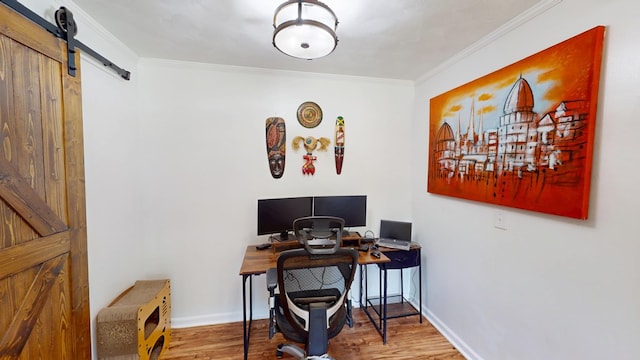 207 Seeba Dr, Dothan, AL 36303 - office featuring a barn door, wood finished floors, and ornamental molding