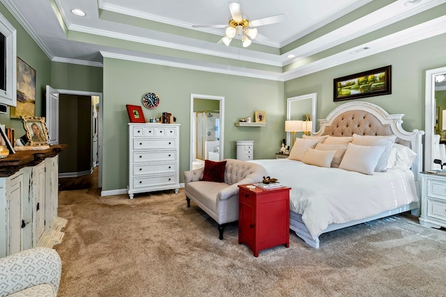 bedroom featuring ornamental molding, a raised ceiling, light carpet, and visible vents