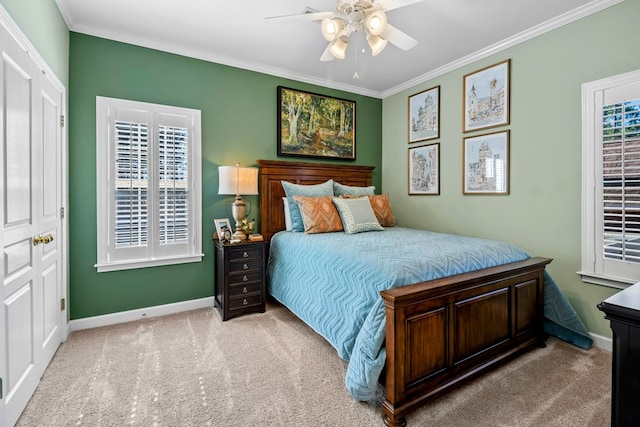 bedroom featuring a ceiling fan, light carpet, crown molding, and baseboards