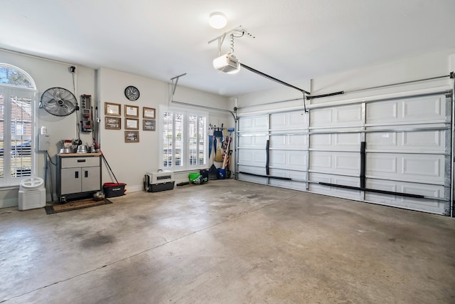 garage featuring a garage door opener