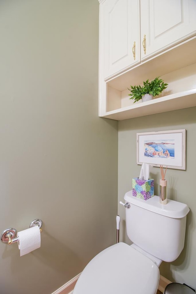 bathroom featuring toilet