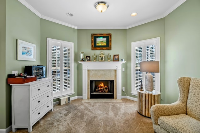 living area featuring recessed lighting, light carpet, a fireplace, baseboards, and crown molding