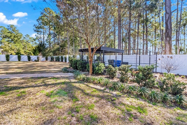 view of yard featuring fence