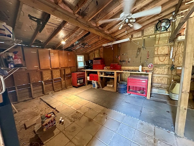 426 Walker Rd, Ozark, AL 36360 - garage with a workshop area and a ceiling fan