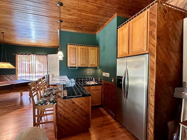 426 Walker Rd, Ozark, AL 36360 - kitchen featuring stainless steel fridge, tile counters, wood ceiling, dark wood-style floors, and crown molding