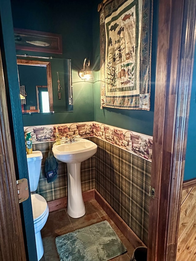 426 Walker Rd, Ozark, AL 36360 - half bath with a wainscoted wall and tile patterned floors