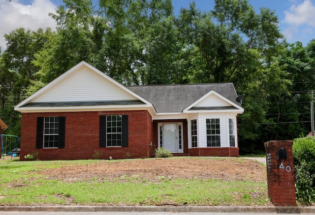 40 Caravan Ln, Kinsey, AL 36303 - view of front of house with brick siding and a shingled roof