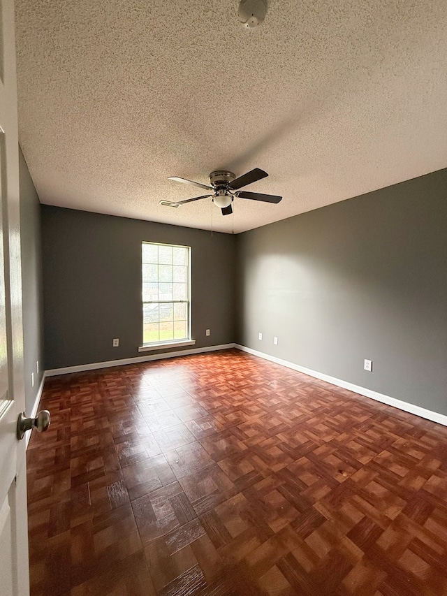 40 Caravan Ln, Kinsey, AL 36303 - spare room featuring ceiling fan, a textured ceiling, and baseboards