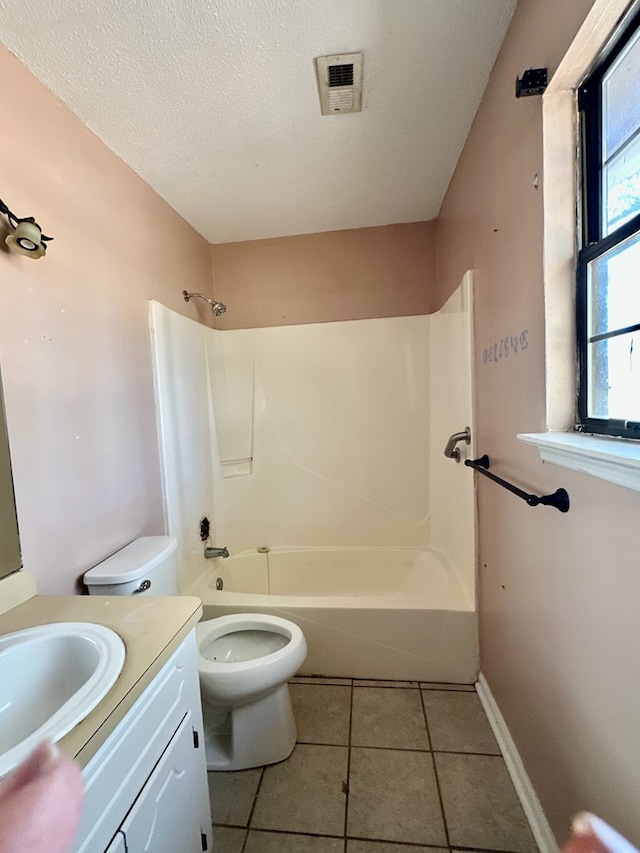 full bathroom with tile patterned floors, visible vents, toilet, and a wealth of natural light
