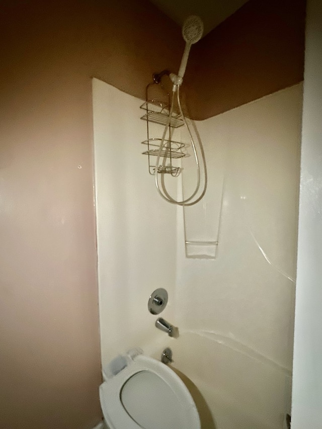 full bath with toilet and shower / bath combination