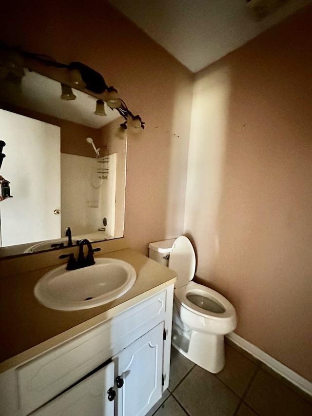 full bathroom with a shower, tile patterned flooring, vanity, toilet, and baseboards